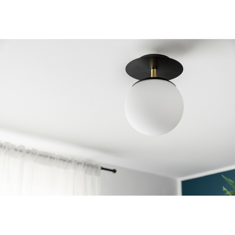 Black wall lamp PLAAT C black sconce with disk, glass shade and brass detail UMMO