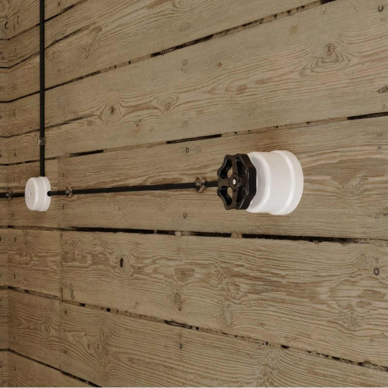 Biały porcelanowy włącznik jednobiegunowy z czarnym pokrętłem - natynkowy Creative-Cables