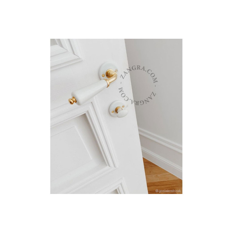 White porcelain and brass door handle Zangra