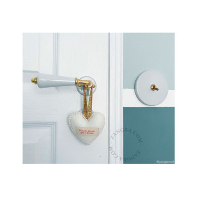 White porcelain and brass door handle Zangra