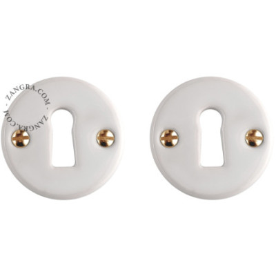 White porcelain keyhole escutcheons - brass screws Zangra