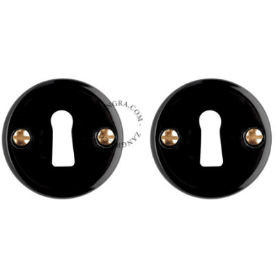 Black porcelain keyhole escutcheons - brass screws Zangra
